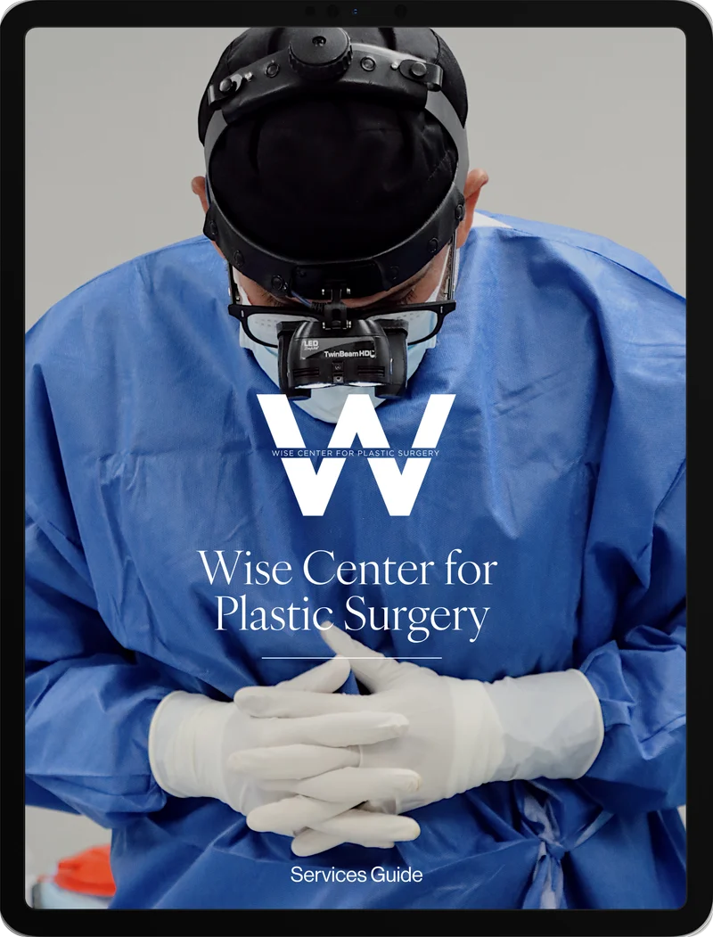 Wise Center for Plastic Surgery services and pricing guide shown on a tablet