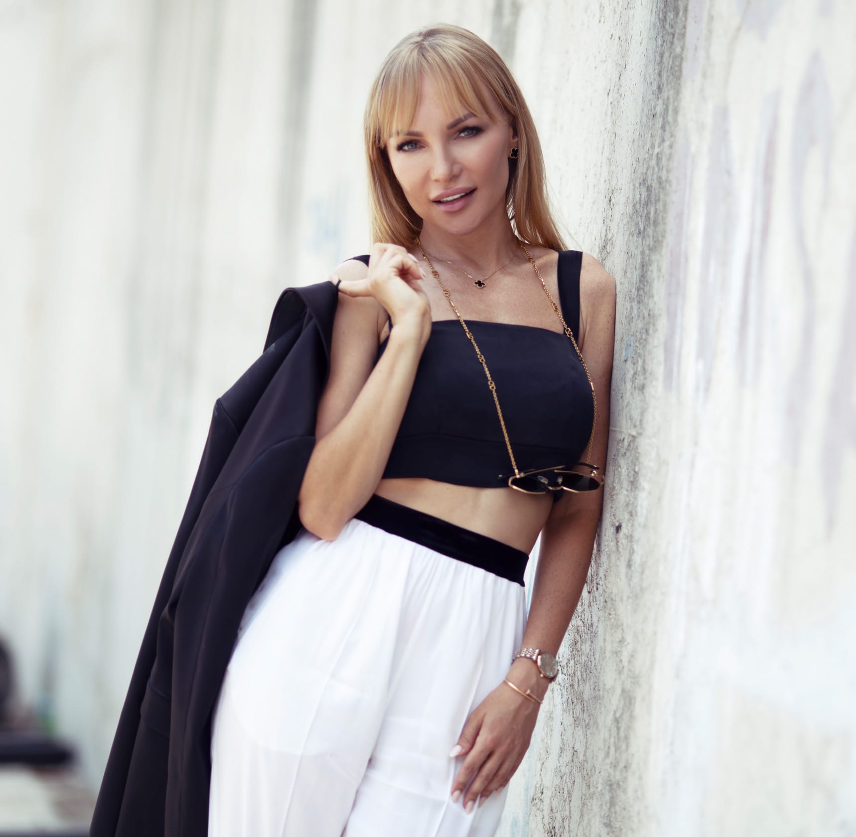Woman leaning on wall